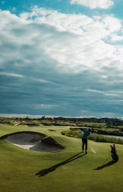 Golfers enjoying a round on a beautifully maintained fairway