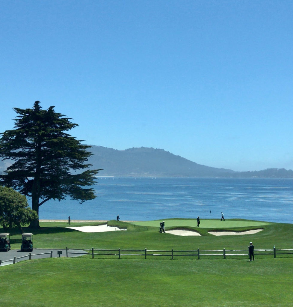 Golf course with pristine greens and challenging bunkers